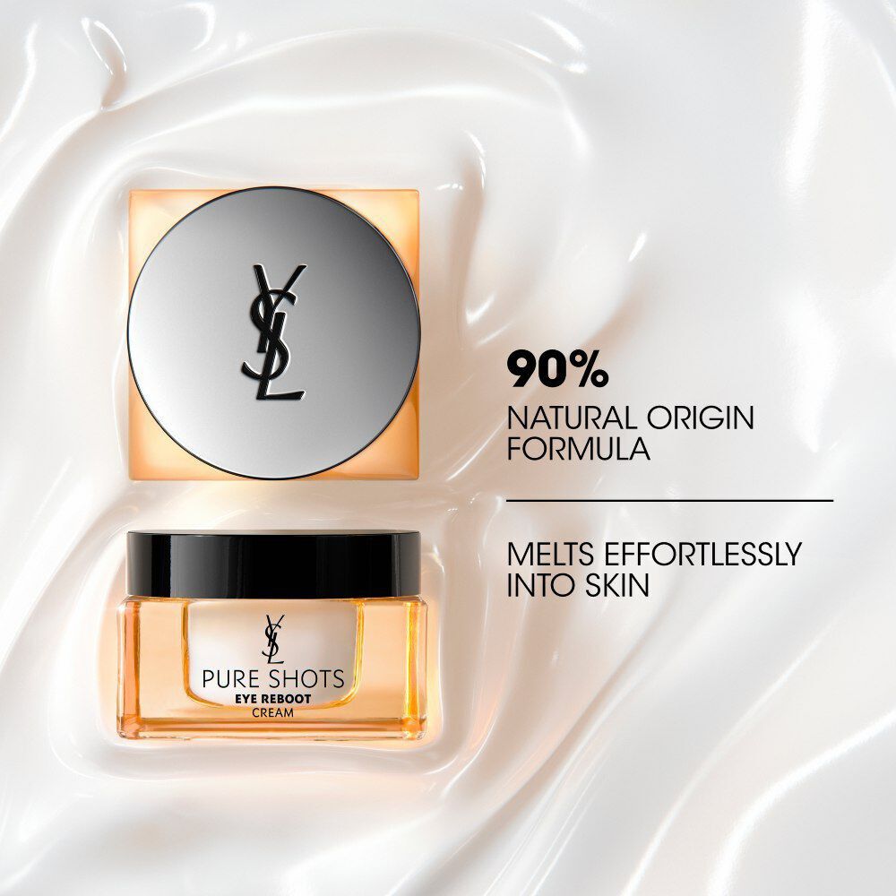 YSL Pure Shots Eye Reboot Cream jar with silver lid, resting on a luxurious bed of white cream texture.