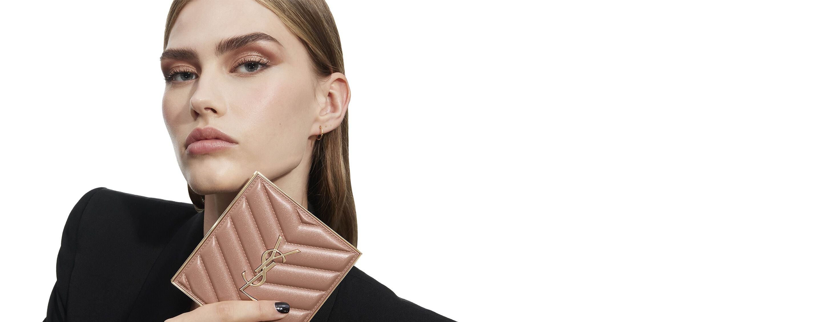 YSL Father's Day blue gift set, featuring the iconic
Cassandre logo, overflowing with delicate blue floral
accents.