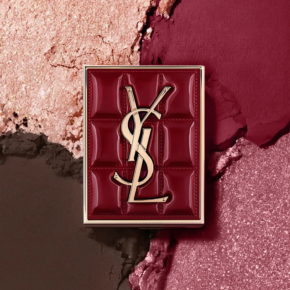 YSL Holiday makeup duo on burgundy texture strokes with palette and gloss