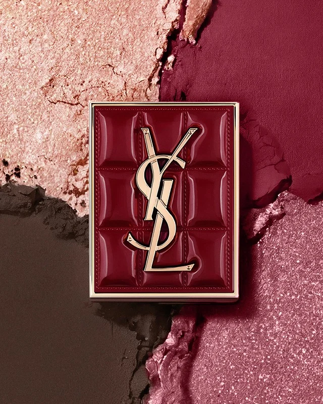 YSL Holiday makeup duo on burgundy texture strokes with palette and gloss