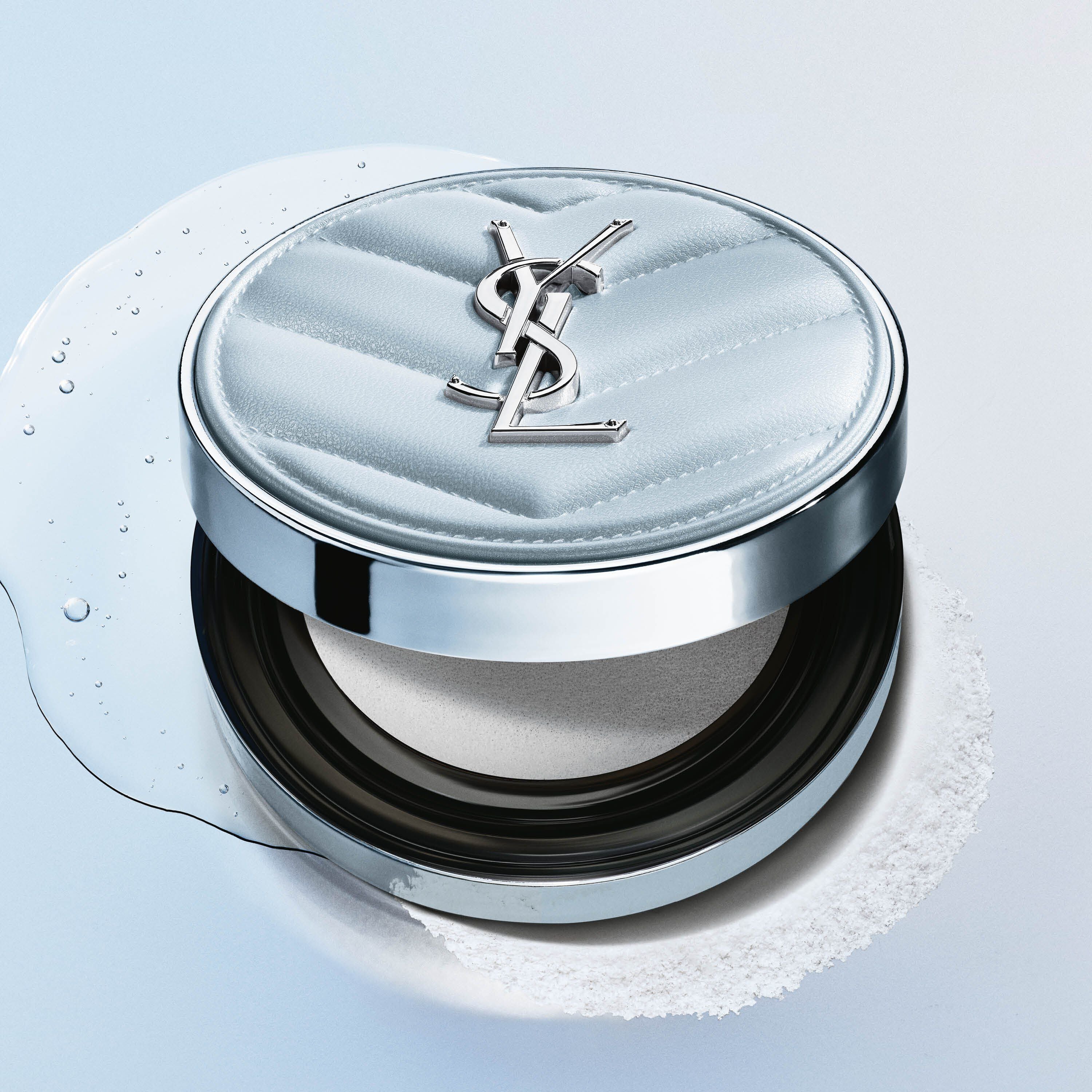 YSL All Hours Blur Cushion, light blue quilted compact, with liquid and powder elements, highlighting its texture.