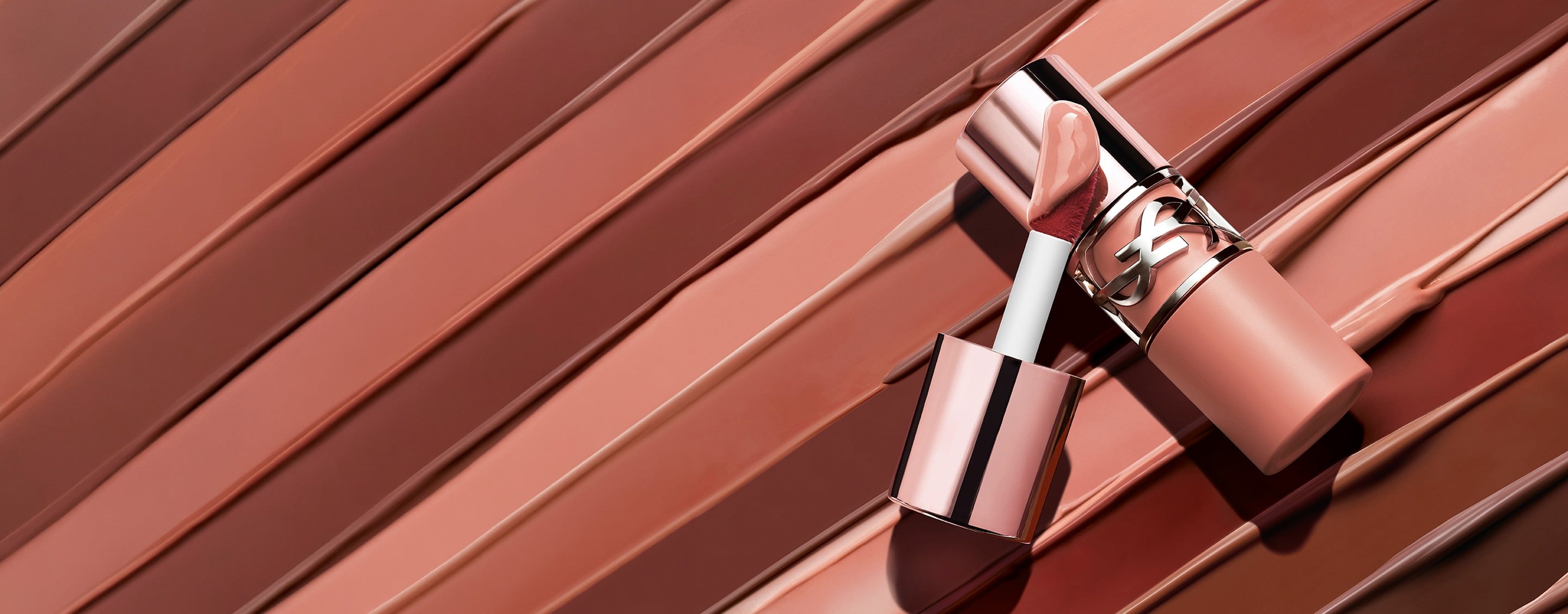 YSL LOVENUDE LIP STAIN on texture

smear showing the weightless serum-in-
stain.